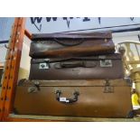 3 vintage suitcases