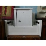 White wooden toy box and white painted single door cab