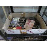 Box of collectables incl. badges, buttons, coins, banknotes etc