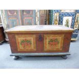 A 19th century painted European Coffer, a hinged top above base painted with square panels of