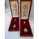 Two silver Jubilee spoons to commemorate Elizabeth II, 1952-1977, 2.2 troy oz both in red cases.