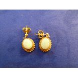 Pair of 9ct yellow gold and opal drop style earrings, stamped 375, gross item weight 2.2g