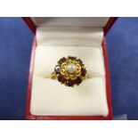 18ct yellow gold cluster style ring set central pearl and garnets, shank stamped 750, size R,