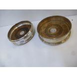 Two plain silver bottle coasters London 1992 and 1993 12.5 Diam.