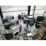 Five vintage Exakta 35mm cameras to include the RTL1000 and the Version 4 model, plus a 135mm