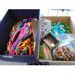 Two boxes of costume jewellery, including hardstone necklaces, fish slice, etc