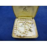 Cultured pearl necklace with a 9ct white gold clasp, by Ciro of Bond Street. Together with a pair of