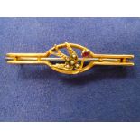 Edwardian 9ct yellow gold bar brooch of bird design set seed pearls and small ruby, stamped 9ct,