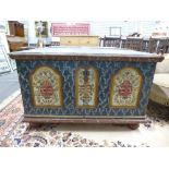 A mid 19th century painted European Coffer, the hinged top above a base painted with the "Jigsaw"