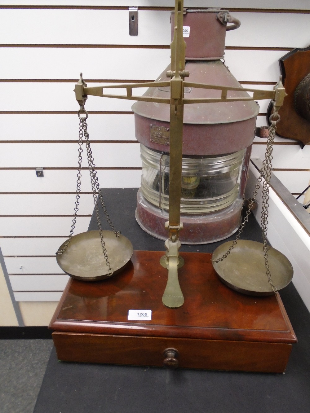 An old set of mahogany and brass weighning scales by W and T Avery