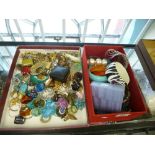 Costume jewellery in two boxes including earrings, bangles, brooches, cufflinks, etc