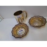 Pair of silver circular bon-bon dishes with embossed acanthus leaf decoration, 12cm diameter,