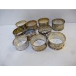 Collection of 10 silver serviette rings, various designs, 5 troy oz