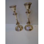 Pair of modern silver candlick with turned solumns, circular bases Birmingham 1995, filled bases,