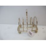 Silver toast rack on ball feet, Sheffield 1921, maker's mark G. & S. Co Ltd for Goldsmiths &