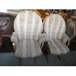 Pair of Dutailer rocking armchairs with locking mechanism