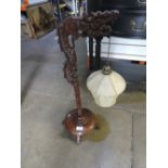 A Chinese carved hardwood table lamp in form of a Dragon, 69cms.