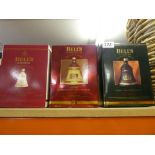 Bottle of President Special Reserve Scottish Whisky in box and 4 Bells whisky decanters, also boxed