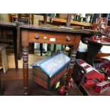 Victorian mahogany drop flap table with drawer above turned supports and Edwardian inlaid mahogany