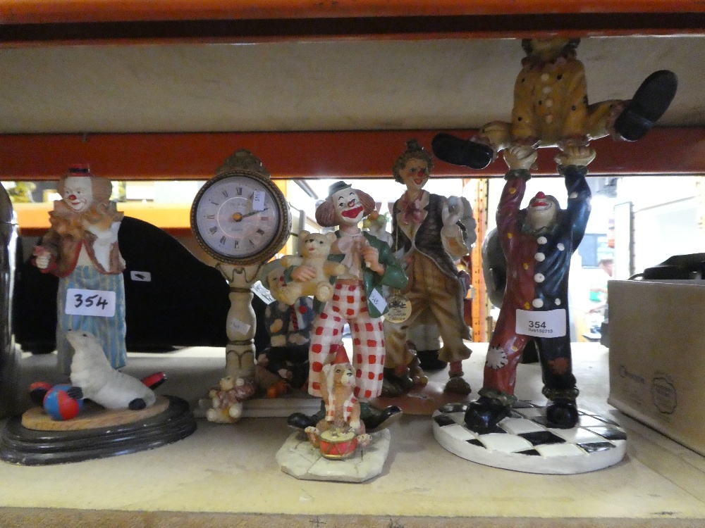 A quantity of resin clown figures some the Leonardo collection.