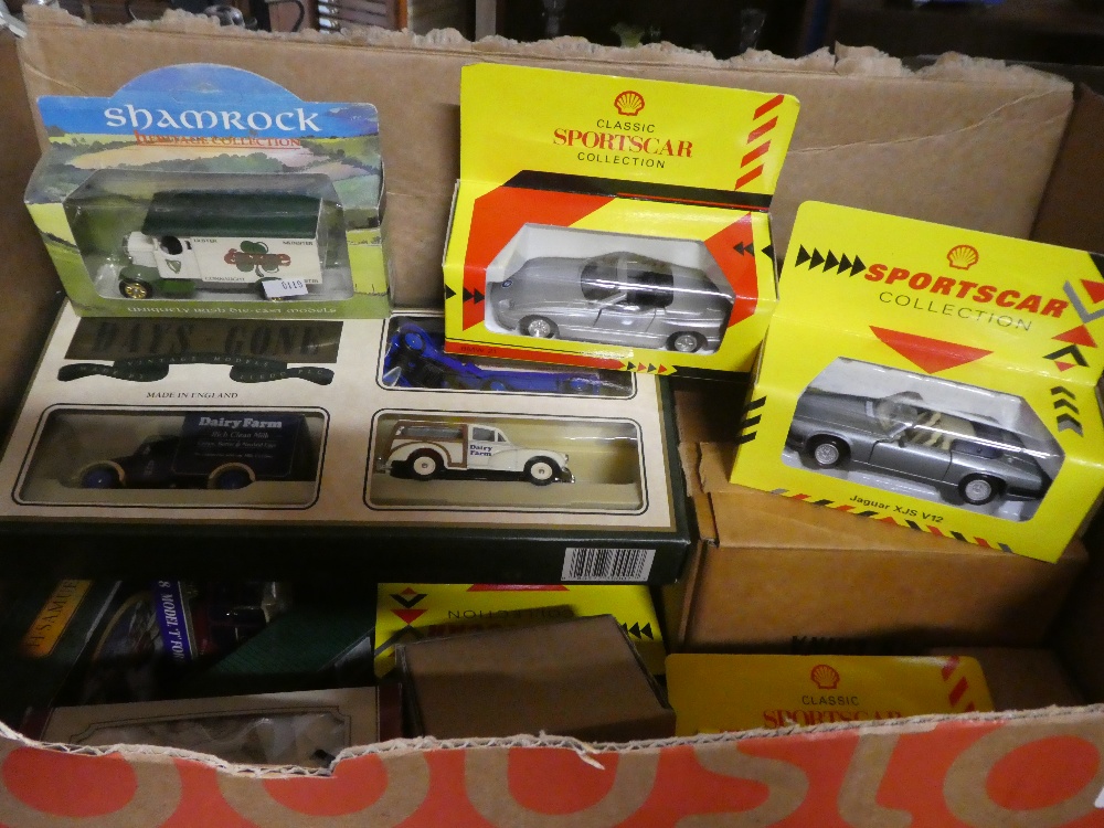 Two boxes of boxed modern Die Cast vehicles etc.