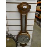 Banjo barometer together with a brass framed bevelled glass wall mirror