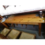 Large rectangular waxed pine dining table and set 6 rush seat and bar back dining chairs