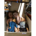 Box of three dolls one having Germany marking to nape of neck together with two framed pictures of