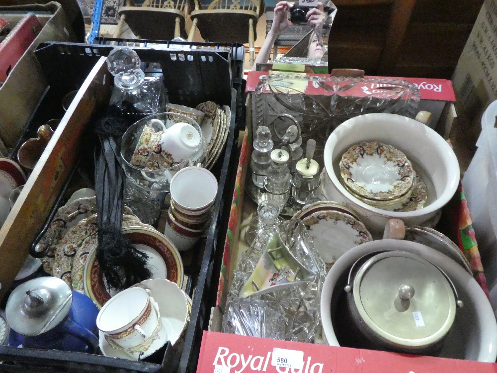 Two boxes of mixed biscuit tin items to include tea ware, glassware chamber pots etc.