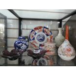 Two shelves of Oriental style ceramics etc.