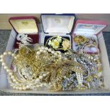 Collection of costume jewellery including simulated pearls & other necklaces, brooches etc.