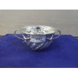 An embossed ornate bowl, silver London 1905, marked C and S. Co Ltd., approx 5.5 troy oz