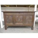 Antique oak coffer having carved front, 111cm