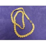 Middle Eastern yellow coloured metal twist style necklace unmarked approx. 22cm long approx. 20g