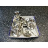 Quantity of silver items including pair of low candle sticks plus a single Va case, Caddy spoon,