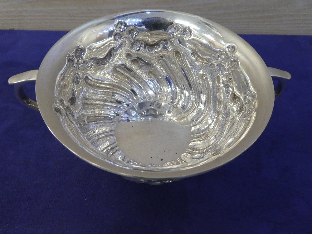 An embossed ornate bowl, silver London 1905, marked C and S. Co Ltd., approx 5.5 troy oz - Image 2 of 3