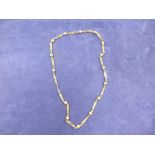 9ct yellow gold necklace with ball spacers, stamped 375, 11.8g