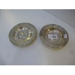 Pair of plain silver circular shallow dishes, London 1962, H.P.L.P. for Tessiers Ltd.,