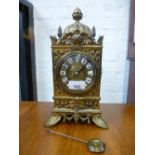 Japy Freres; a French gilt metal mantel clock with pierced decoration on splay feet, 31 cms