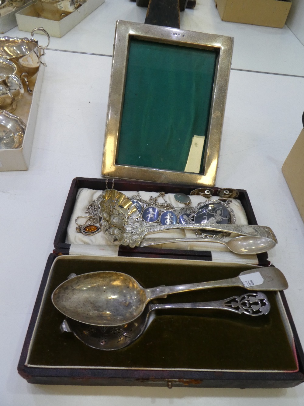 Georgian silver sugar sifting spoon with berry decorated bowl silver tea strainer, boxed silver