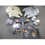 A vintage Millennium Falcon and other Star Wars items