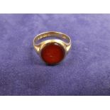 Gents 15ct yellow gold seal ring, inset with Carnelian stamped 15, size U/V gross weight 6.5g