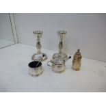 Pair of salts, silver pepper pot and a pair of silver candle sticks, total approx 2 troy oz