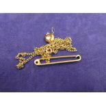 15ct yellow gold bar brooch stamped 15, 3.2g, 9 ct yellow gold neck chain stamped 9ct, 6.6g etc.