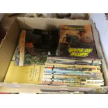 A quantity of vintage commando magazines together with a quantity of The Observer books including