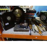 A quantity of old mill shuttles, mantle clocks, annuals etc.