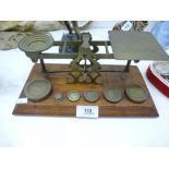 Vintage set of postal scales complete with weights.