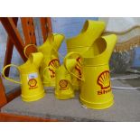 Set of 5 Shell oil cans