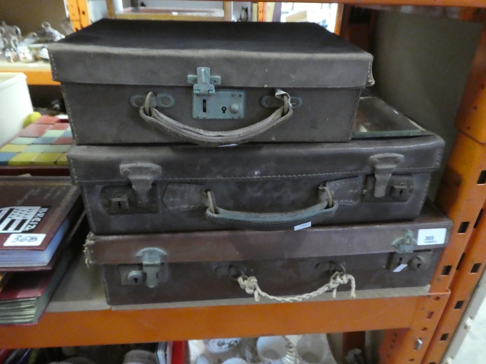 Three small vintage suitcases