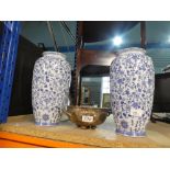 A pair of Blue & White vases and a decorative plated pierced bowl.